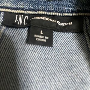 INC denim jacket with sweater sleeves